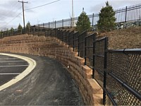<b>Chain Link Stepped Site Fencing at Buzzuto Oakcrest Conifer</b>